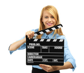 Young attractive woman holding film clapper isolated on white