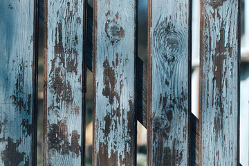 Blue old distant boarded fence