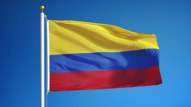 Colombia flag waving in slow motion against clean blue sky, seamlessly looped, close up, isolated on alpha channel with black and white luminance matte, perfect for film, news, digital composition