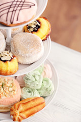 Obraz na płótnie Canvas Cake stand with different sweets