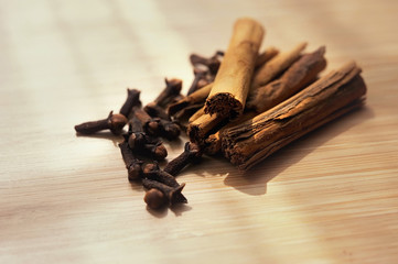 spice cinnamon clove on a wooden board