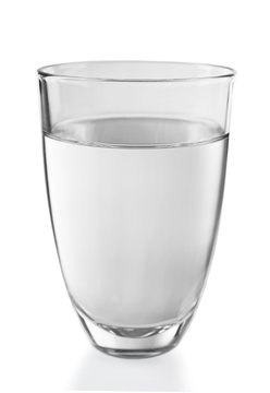 Glass of water on the grey background, close up