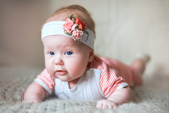3 month baby with flowers