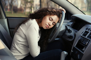 Woman sleeping in car