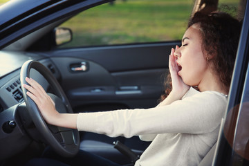 Woman sleeping in car