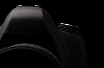 Image of a professional modern DSLR camera low key image - Modern DSLR camera with a very wide...