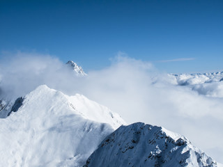 Fototapeta na wymiar Wintertime early morning sea of clouds – mountain top Austrian