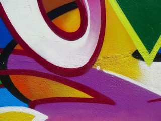 Painted Wall: Colorful Abstract Pattern in Detail of Graffiti  
