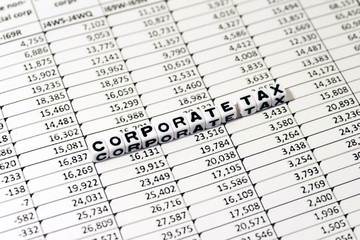 CORPORATE TAX on white cube