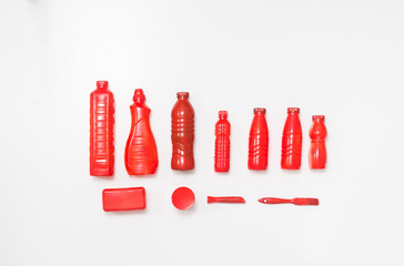 Bottles painted in red color.