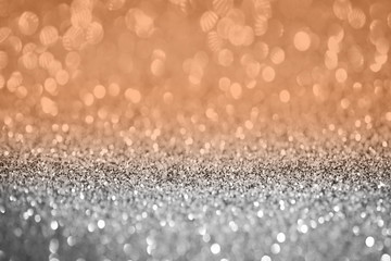 orange and silver bokeh glitter abstract background