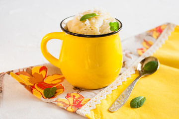 coconut cake in a cup on a table, selective focus