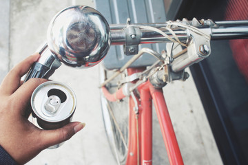 Cola can with bicycle