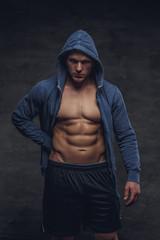 Abdiminal man in a blue hoodie.