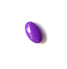 purple pills on white background isolated