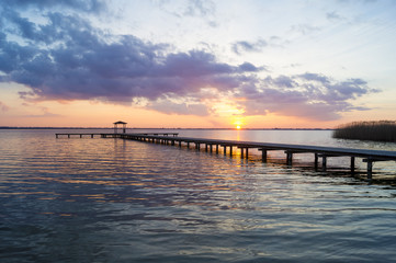 Fototapeta na wymiar wooden pier by the sea 