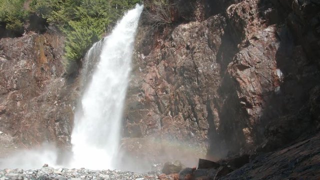 Pan to Waterfall and Rainbow at Franklin Falls, Washington