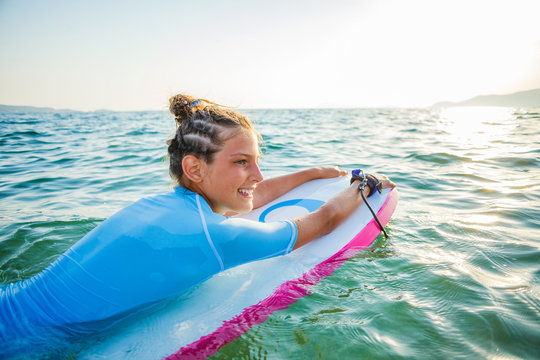 Young surfer girl