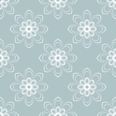 Floral ornament. Seamless abstract light blue and white background with fine pattern