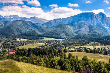 Landscape of Tatra Mountains, view at Zakopane from the top of Gubalowka - obrazy, fototapety, plakaty