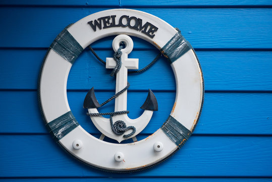 anchor on wall background,little toy boat with anchor