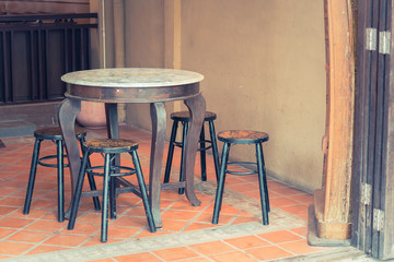 Old Wooden tables and chairs add vintage color