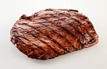 Thick succulent portion of barbecued flank steak
