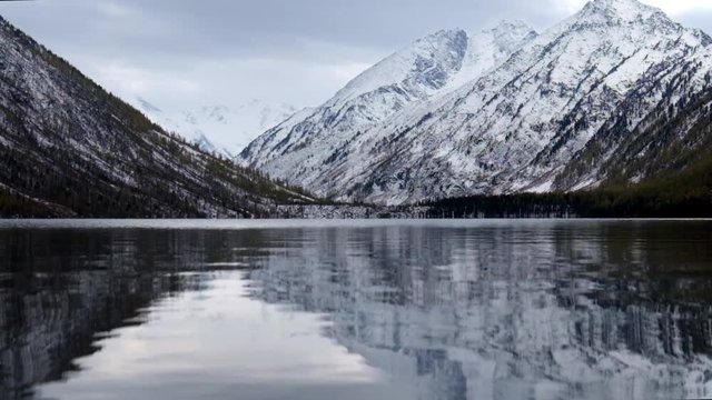 Lower Multinskoe lake in the Altai Mountains in cloudy weather
