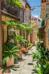 Panele Szklane  Udekorowana ulica w małym miasteczku we Włoszech, Umbria