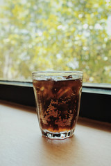 Cola with ice cubes