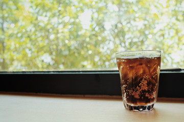 Cola with ice cubes