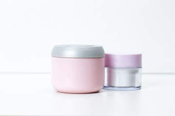 Cosmetic containers isolated on white