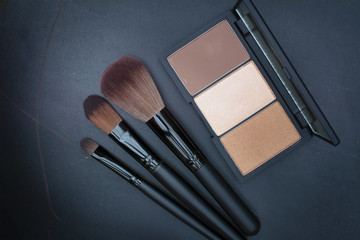 dark tone selective focus on beautiful brown cheek blusher kit