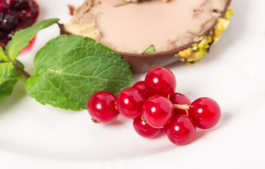 Delicious foie gras covered with dark chocolate.