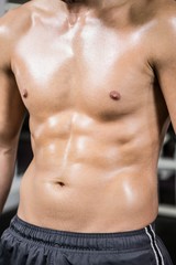 Fototapeta premium Mid section of smirtless muscular man