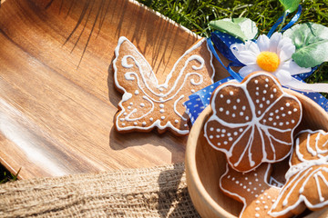 decorated gingerbread on a wooden plate with copy space