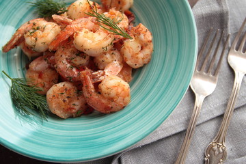 Plate with fresh shrimps with fresh dill
