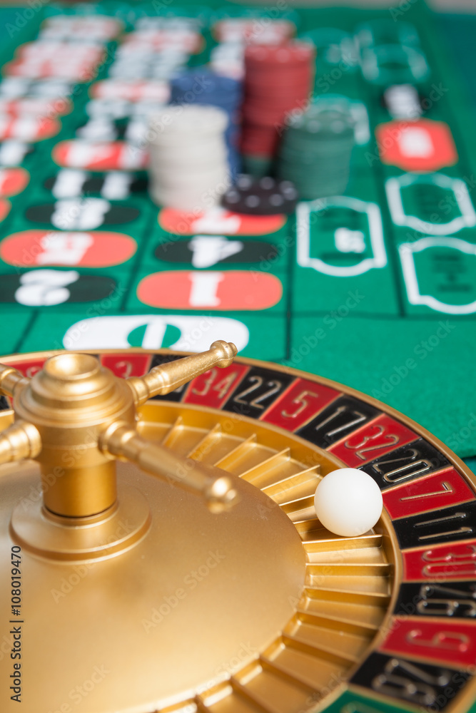 Wall mural casino roulette wheel with the ball on number 7