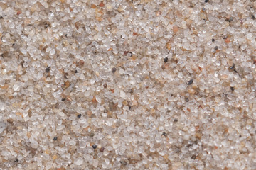 granules of sand on beach macro texture