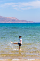 Fototapeta na wymiar girl squirting in the sea
