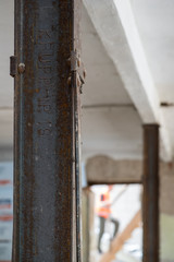 Steel beam with an old inscription.