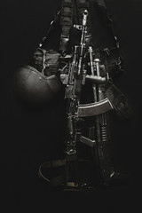 machine gun AK, military helmet and ammunitions