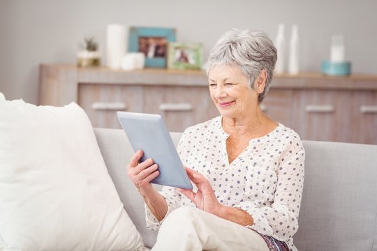 Senior Woman Using Digital Tablet