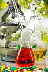 Image of laboratory glassware and microscopy on DNA strand background  close-up