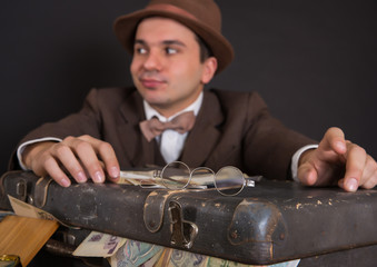 Numismatist with his coin collection