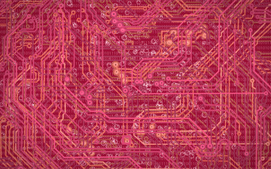 abstract image of microcircuit against a red background close-up