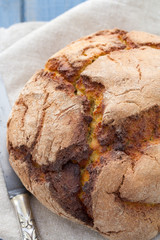 cornbread on napkin with knife