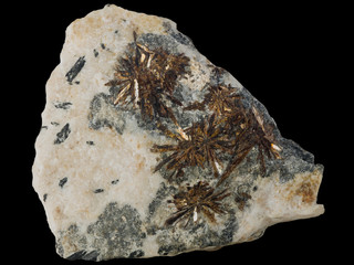 astrophyllite stone with textured surface macro on black backround