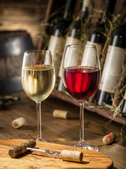 Wine bottles on the wooden shelf. © volff