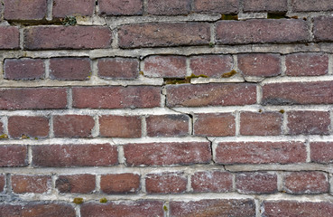 old brick wall with square tiles